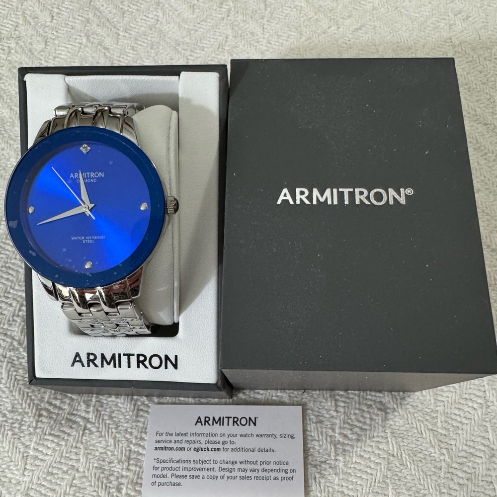 Armitron Silver Watch with Vibrant Blue Face